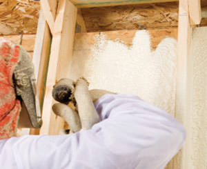 Spray foam insulation being installed by a certified professional in Connecticut